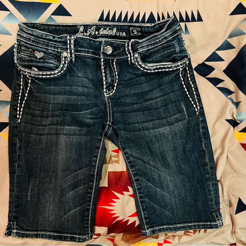 Women’s capris, and shirts, size 9 and large too small shirts